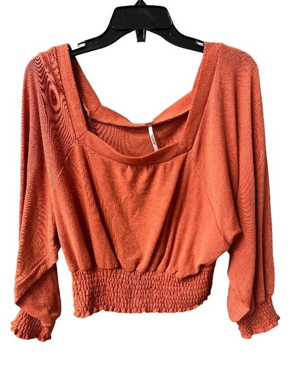 women's tops for those who want to add a touch of elegance and sophistication to their everyday wearTop Long Sleeve By Free People In Orange, Size: M