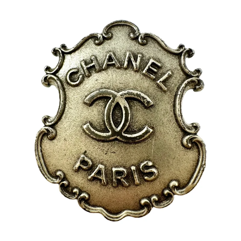 women's fair-trade dressesChanel Paris Dallas Sheriff Badge Pin